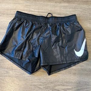 Wet look Nike running shorts